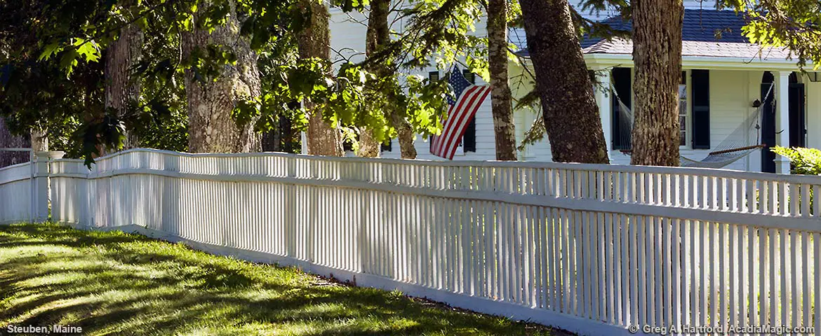 A charming white fence in Steuben, Maine