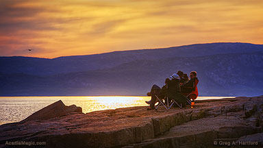 Some visitors to Acadia National Park are relaxing at Schoodic Point on the mainland of Maine.