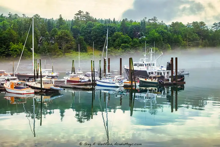 Yachts in Northeast Harbor, Maine on foggy morning