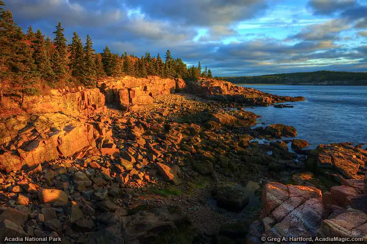 Wet Pink Granite turned red at sunrise near Thunder Hole