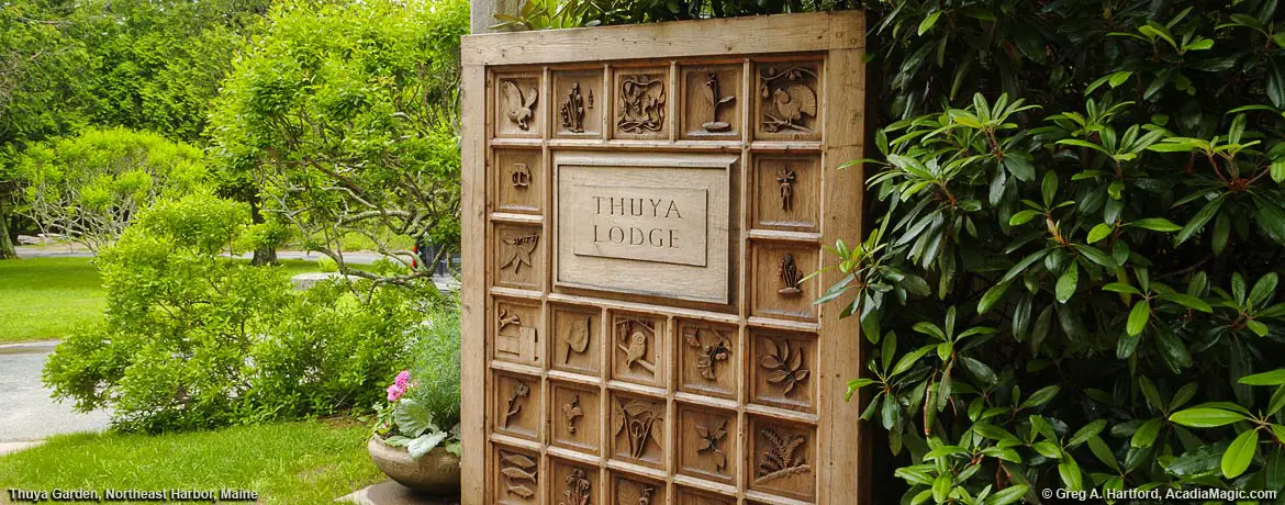 Thuya Garden and Thuya Lodge carved wooden entrance door