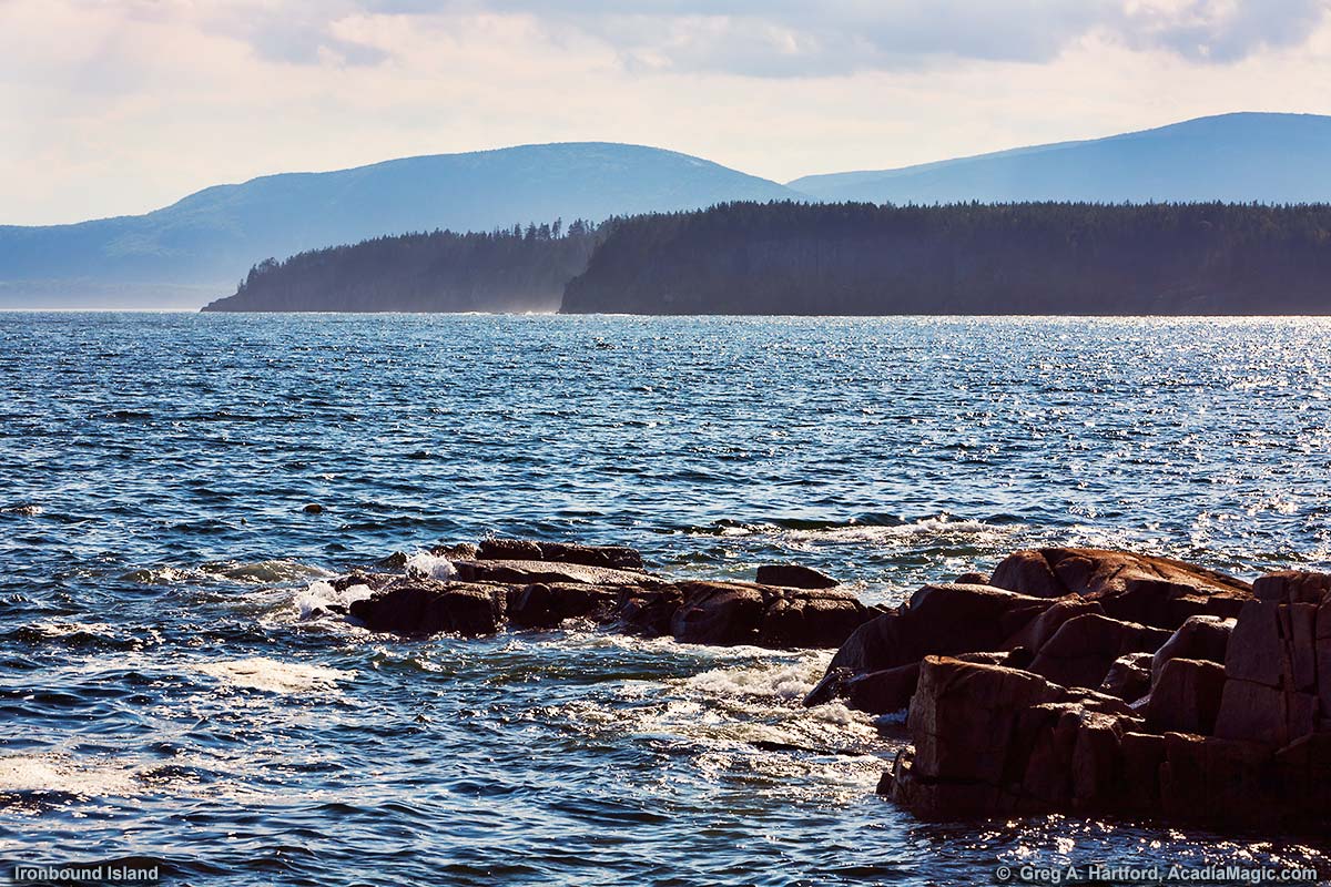 This photo shows Ironbound Island with Mount Desert Island in the background.