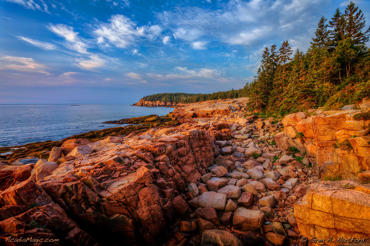 Sunrise on the eastern side of Mount Desert Island in Acadia National Park showing Otter Cliff
