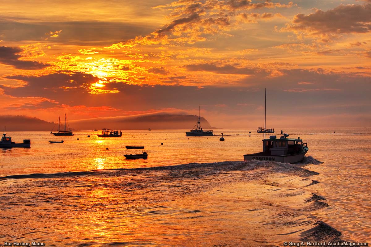 A lobster boat leaves Bar Harbor to collect a harvest of Maine lobster.