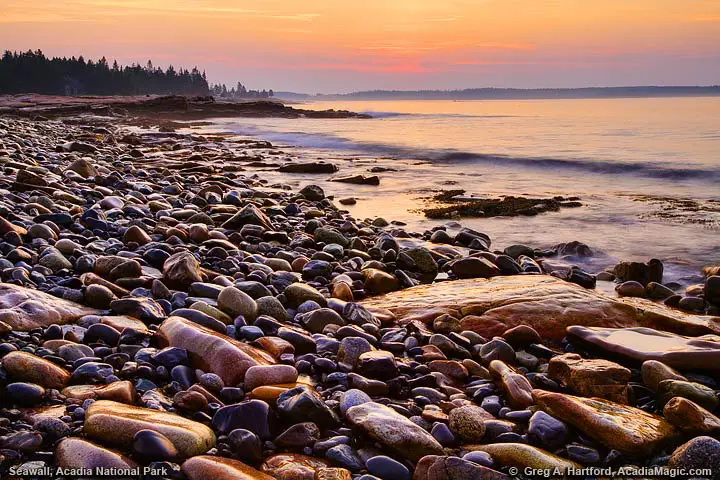 Seawall with many small rocks and boulders