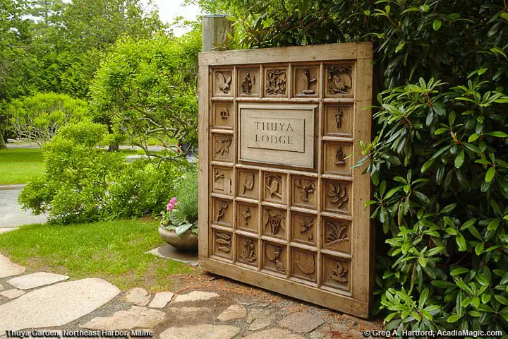 Carved cedar door entrance to Thuya Garden and Lodge