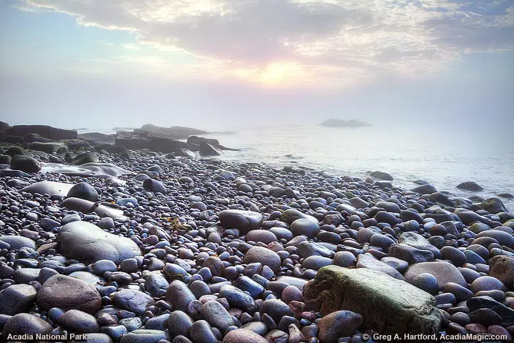 Foggy morning sunrise in Monument Cove