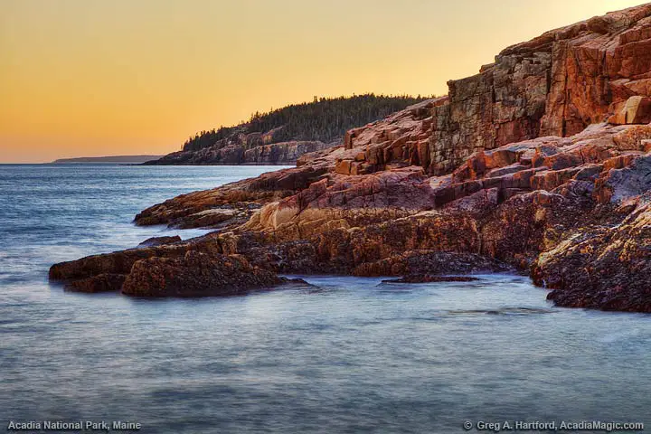 This whole side of Mount Desert Island is in shadow but you can see Otter Cliff.