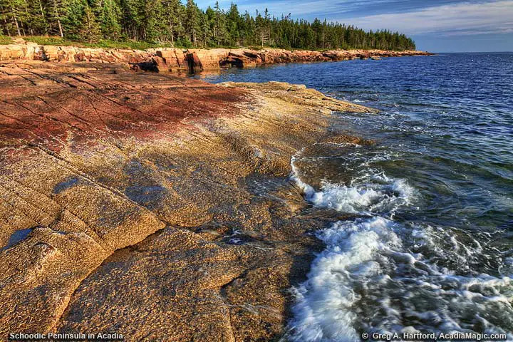 Close-up of waves and shoreline at sunset